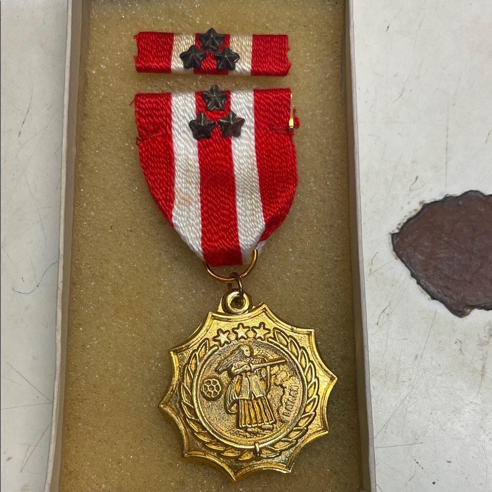 Gold and Red Medal with Ribbon